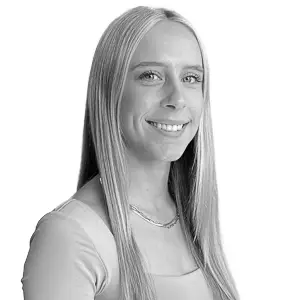 Professional studio headshot of Annika Lund, Director of Operations at First Fridays CRE.