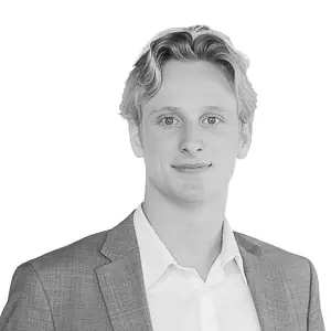 Professional studio headshot of Ryan Bickford, Director of Sponsor Relations at First Fridays CRE.